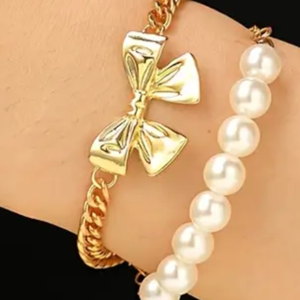 Elegant Gold Tone Bow Bracelet with Faux Pearls